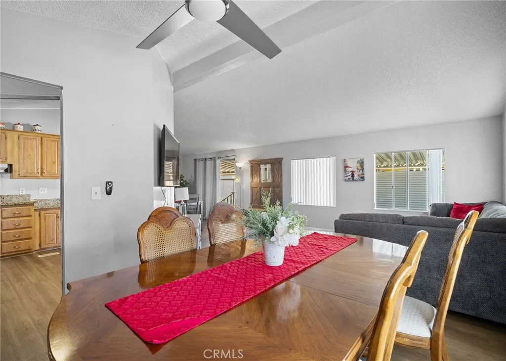 27701 Murrieta Road, Unit 37 Menifee, CA 92586 - Photo 7 of 24 a view of a dining room with furniture