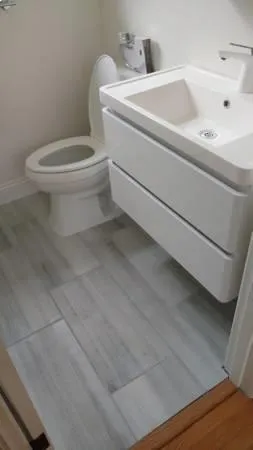 a bathroom with a toilet and a sink