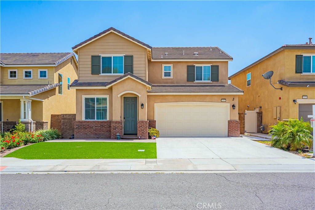 Welcome home to 10952 Knoxville Way inside the gated community of Riverwalk Vista.