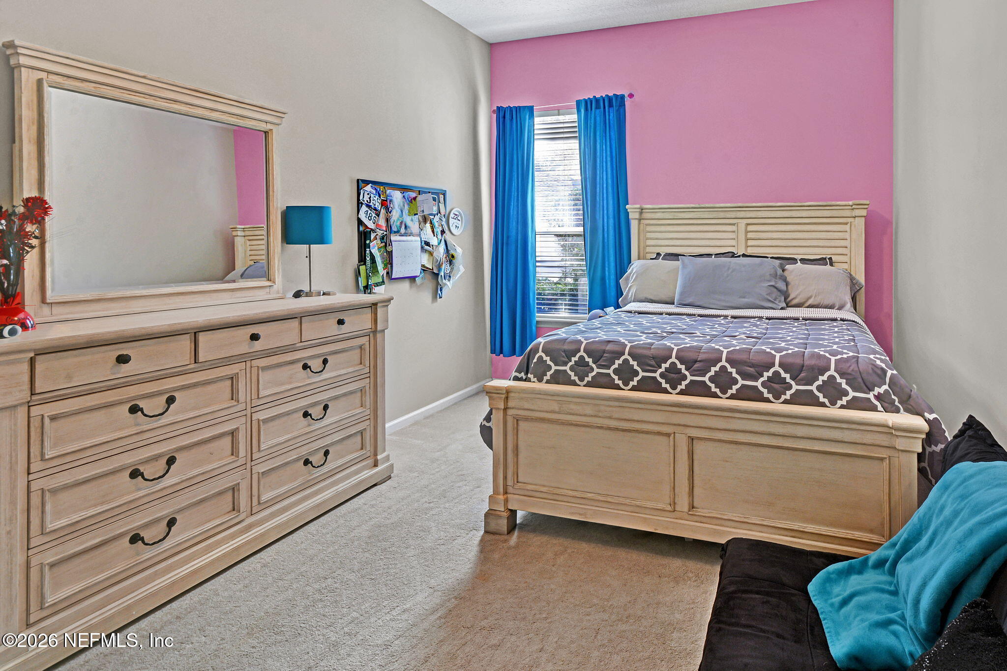 237 Twining Trace Jacksonville, FL 32259 - Photo 15 of 24 a bedroom with a bed and a dresser