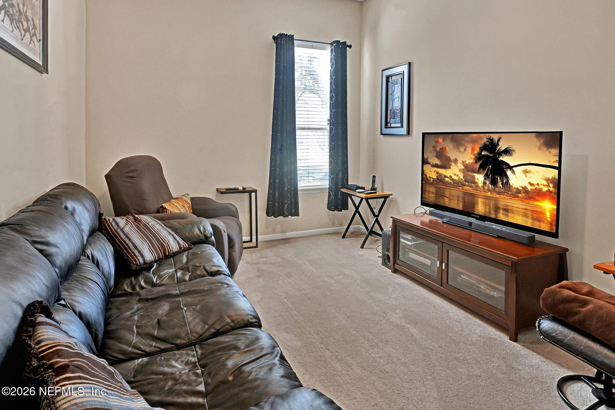 237 Twining Trace Jacksonville, FL 32259 - Photo 19 of 24 a living room with furniture and a flat screen tv