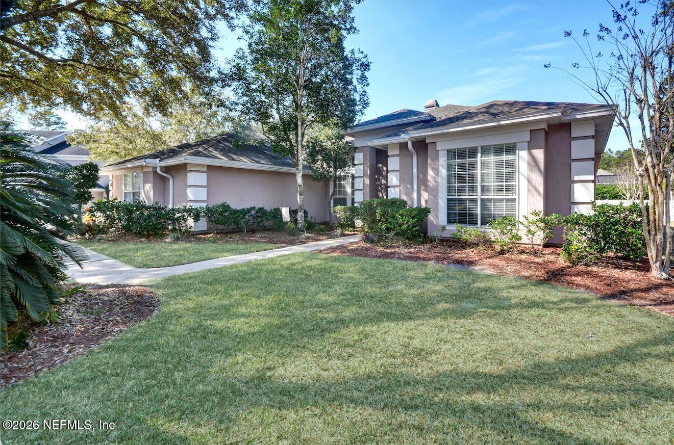 237 Twining Trace Jacksonville, FL 32259 - Photo 2 of 24 a front view of a house with garden