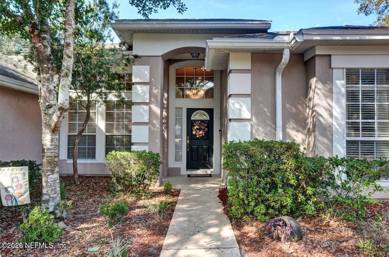 237 Twining Trace Jacksonville, FL 32259 - Photo 3 of 24 a front view of a house with garden