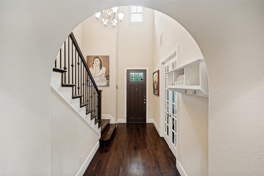 773 South Coppell Road Coppell, TX 75019 - Photo 4 of 30 a view of a hallway with wooden floor and staircase