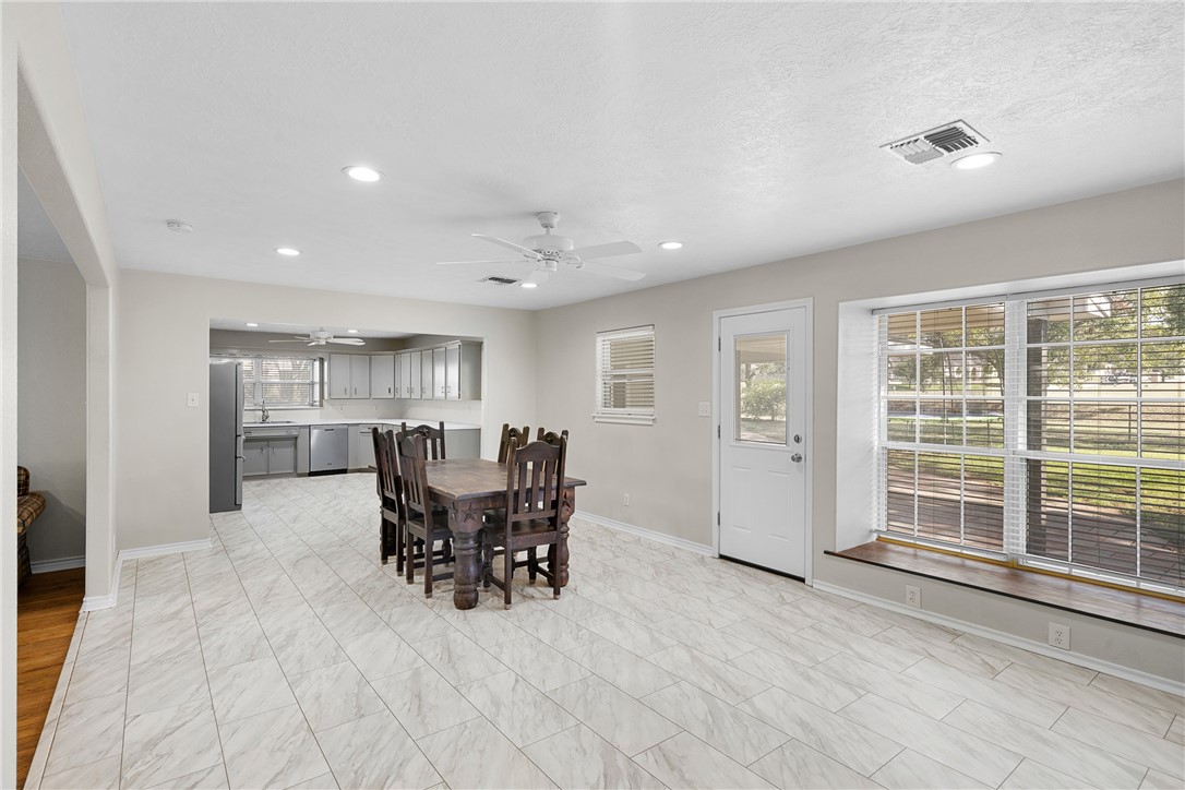 1906 Gun And Rod Road Brenham, TX 77833 - Photo 15 of 30 Dining space featuring a ceiling fan, plenty of natural light, and recessed lighting