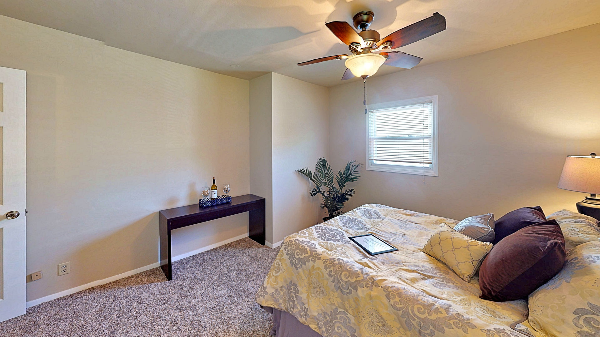 505 South Oltendorf Road Streamwood, IL 60107 - Photo 11 of 19 a bedroom with a bed and a ceiling fan