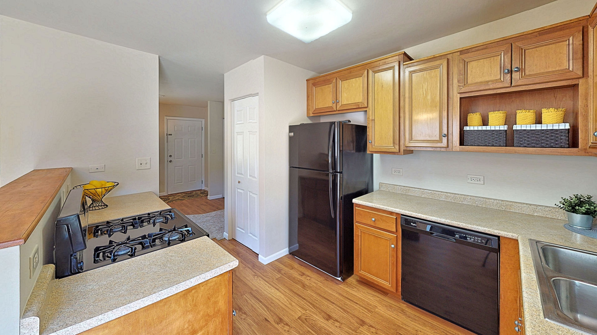 505 South Oltendorf Road Streamwood, IL 60107 - Photo 6 of 19 a kitchen with stainless steel appliances a stove a refrigerator and a window
