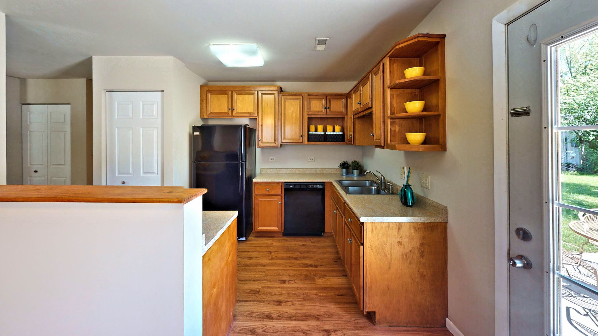 505 South Oltendorf Road Streamwood, IL 60107 - Photo 7 of 19 a kitchen with stainless steel appliances granite countertop a refrigerator a stove top oven a sink and dishwasher