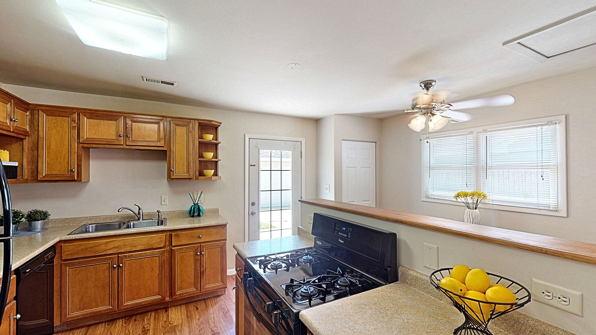 505 South Oltendorf Road Streamwood, IL 60107 - Photo 8 of 19 a kitchen with stainless steel appliances granite countertop a sink stove and refrigerator