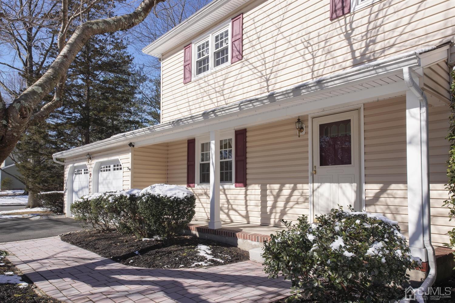 7 Markus Drive Kendall Park, NJ 08824 - Photo 13 of 47 a front view of a house with garden
