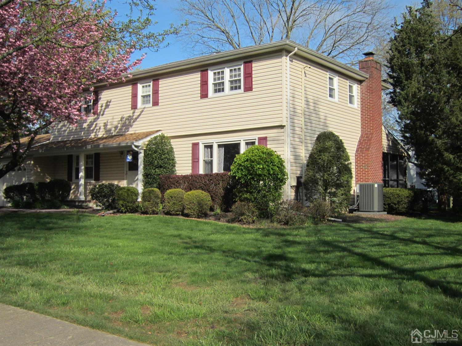 7 Markus Drive Kendall Park, NJ 08824 - Photo 2 of 47 a front view of a house with a garden