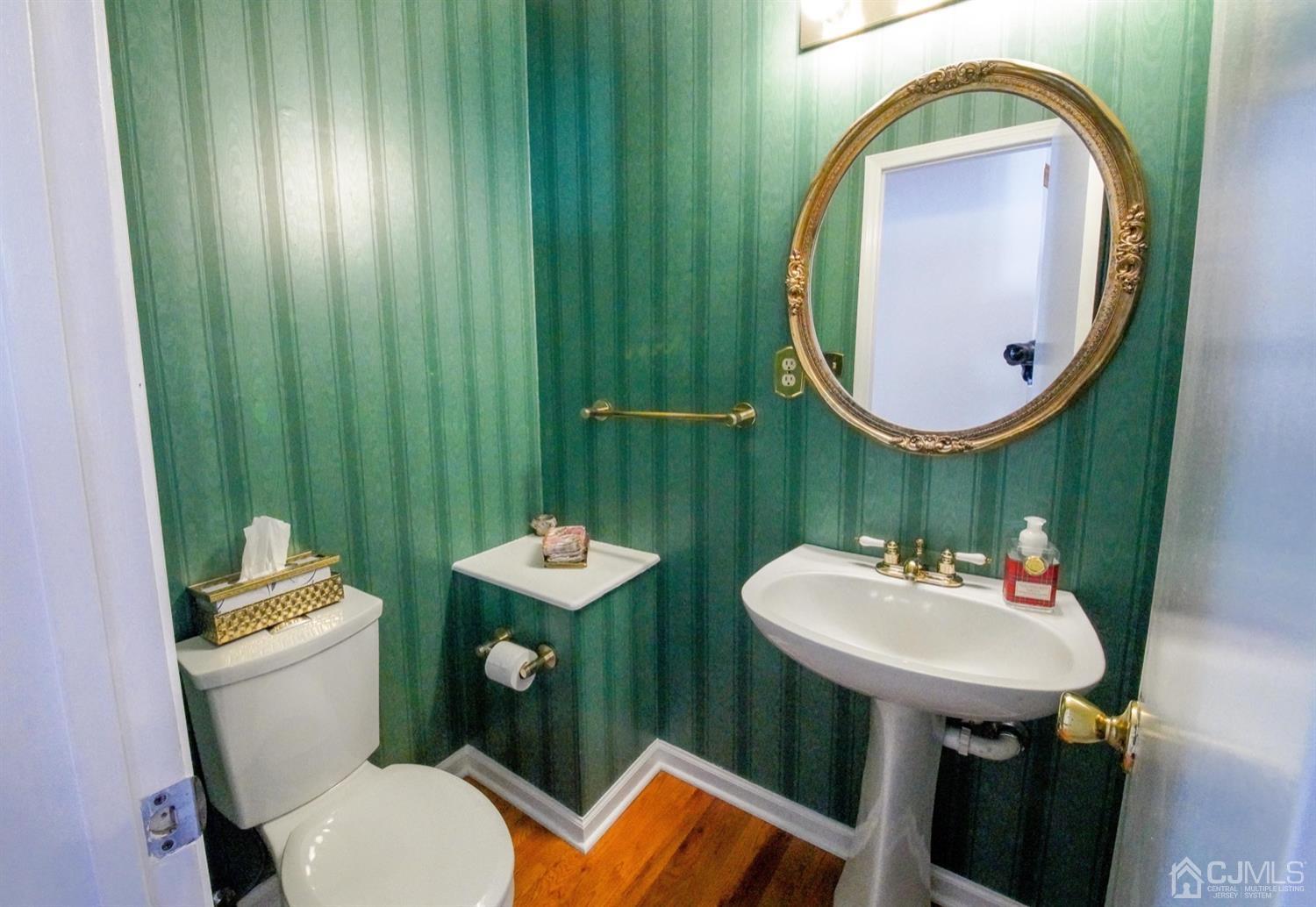 7 Markus Drive Kendall Park, NJ 08824 - Photo 24 of 47 a bathroom with a sink mirror and toilet