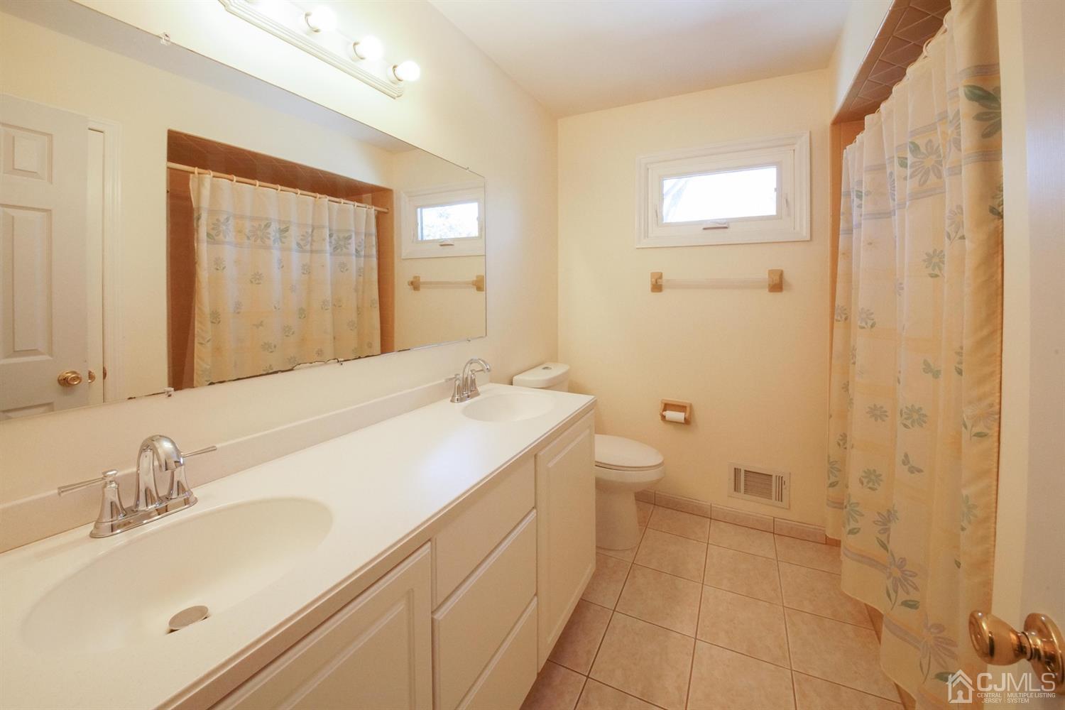 7 Markus Drive Kendall Park, NJ 08824 - Photo 25 of 47 a bathroom with a sink a toilet and shower