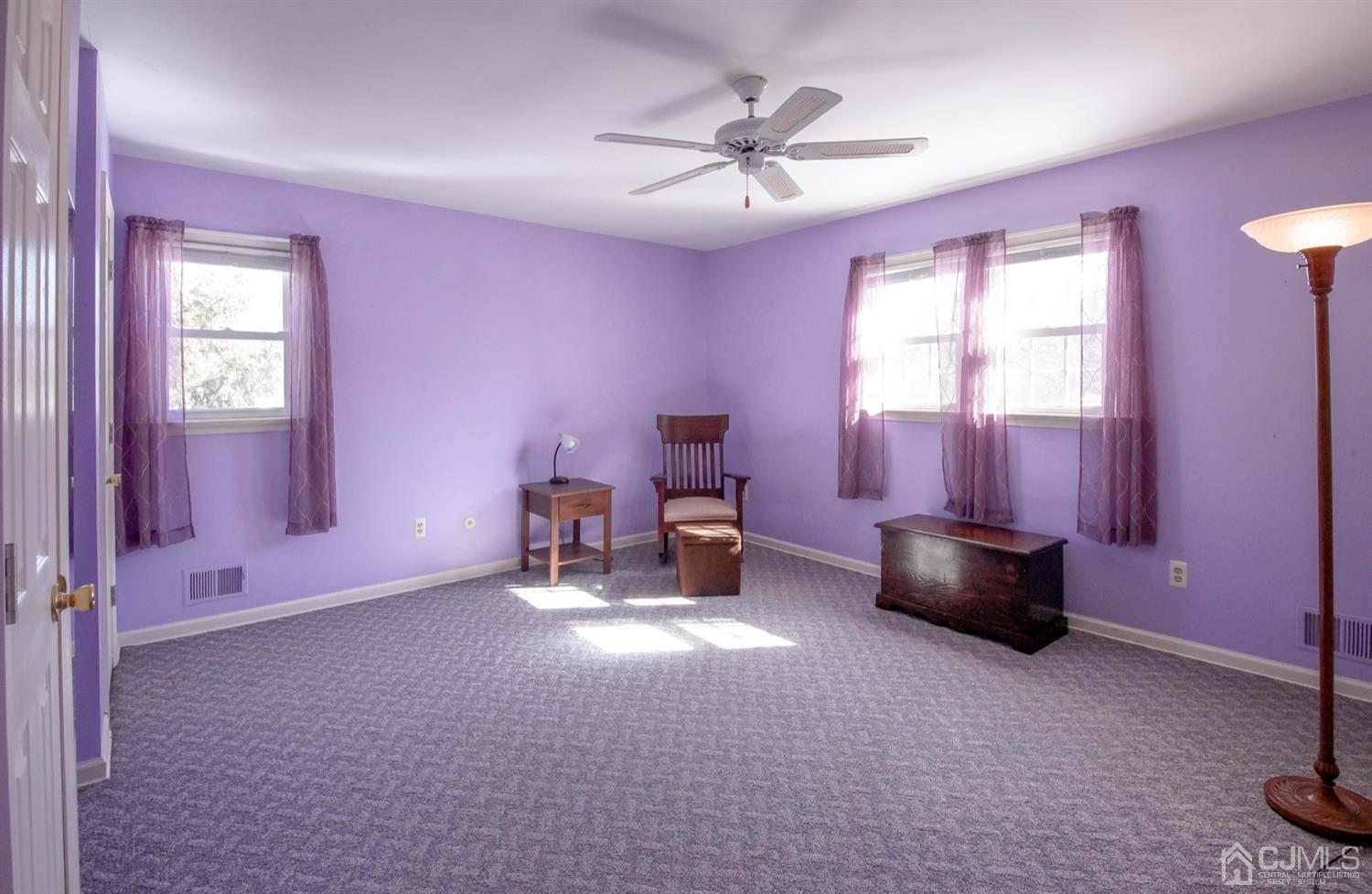 7 Markus Drive Kendall Park, NJ 08824 - Photo 27 of 47 a living room with furniture and a window