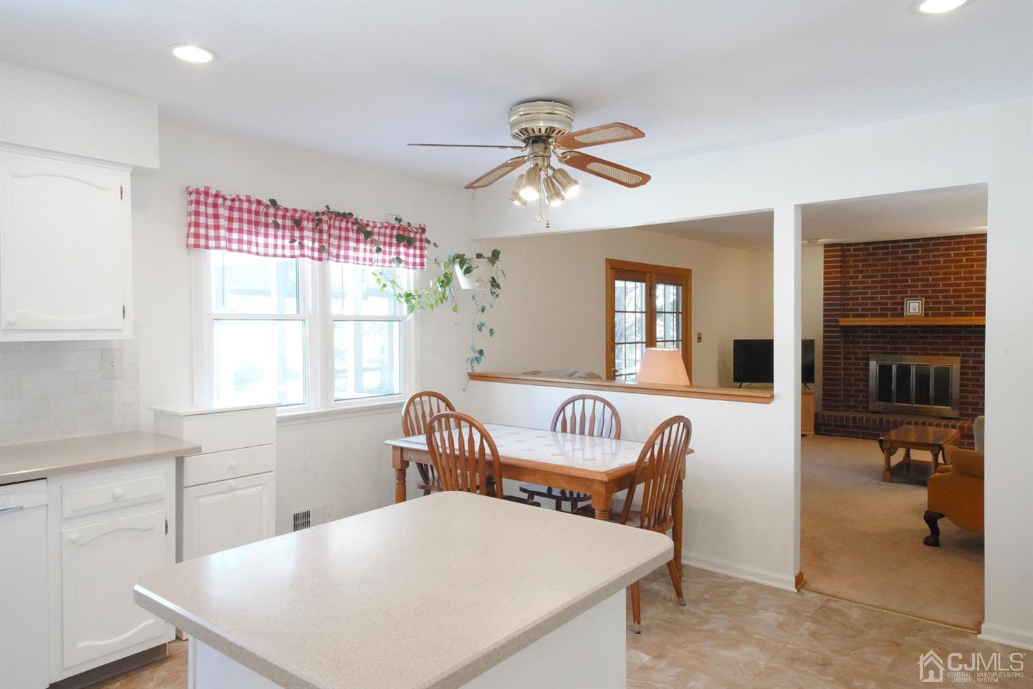 7 Markus Drive Kendall Park, NJ 08824 - Photo 36 of 47 a living room with furniture and a window
