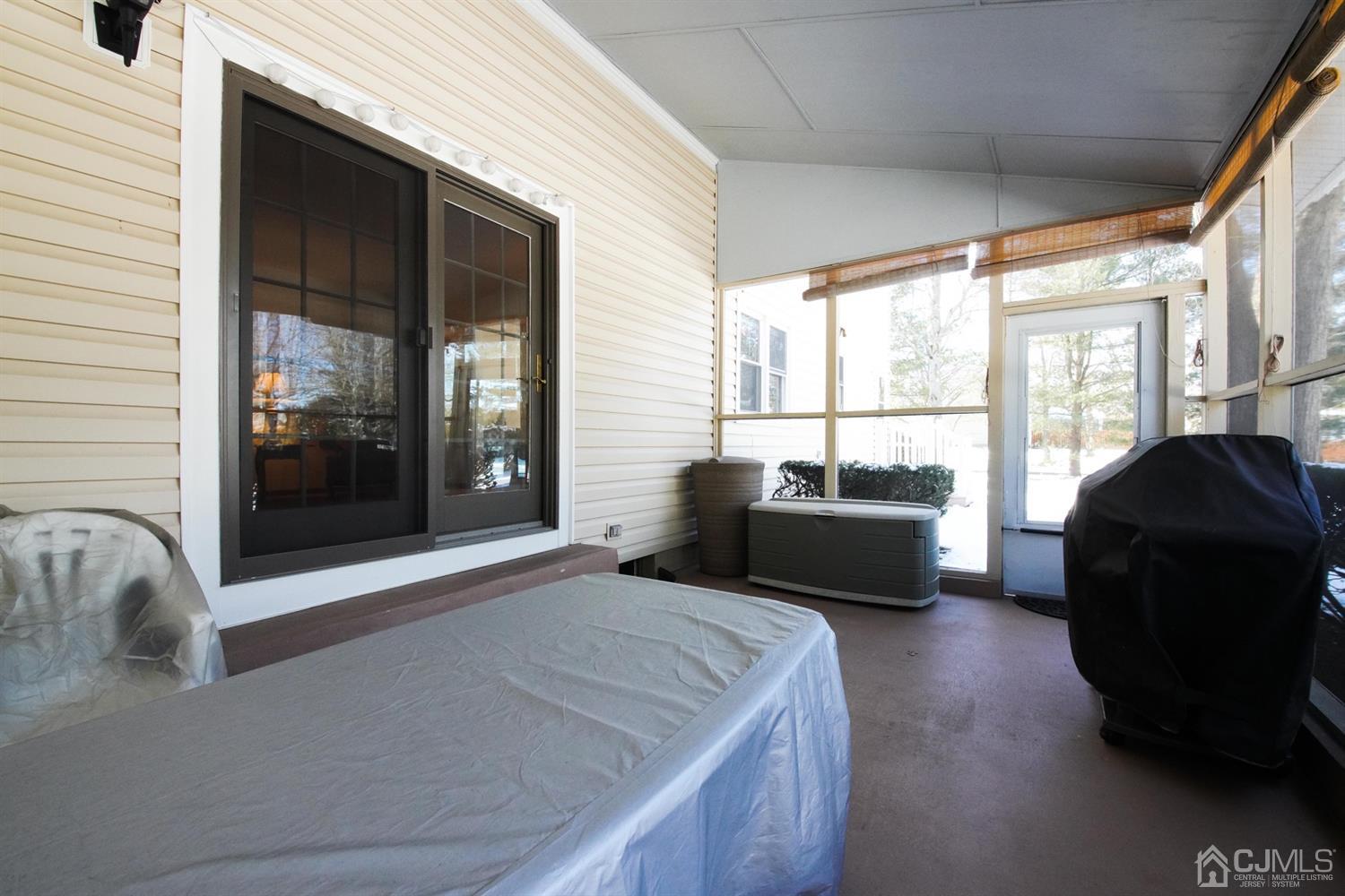7 Markus Drive Kendall Park, NJ 08824 - Photo 41 of 47 a living room with furniture and a large window