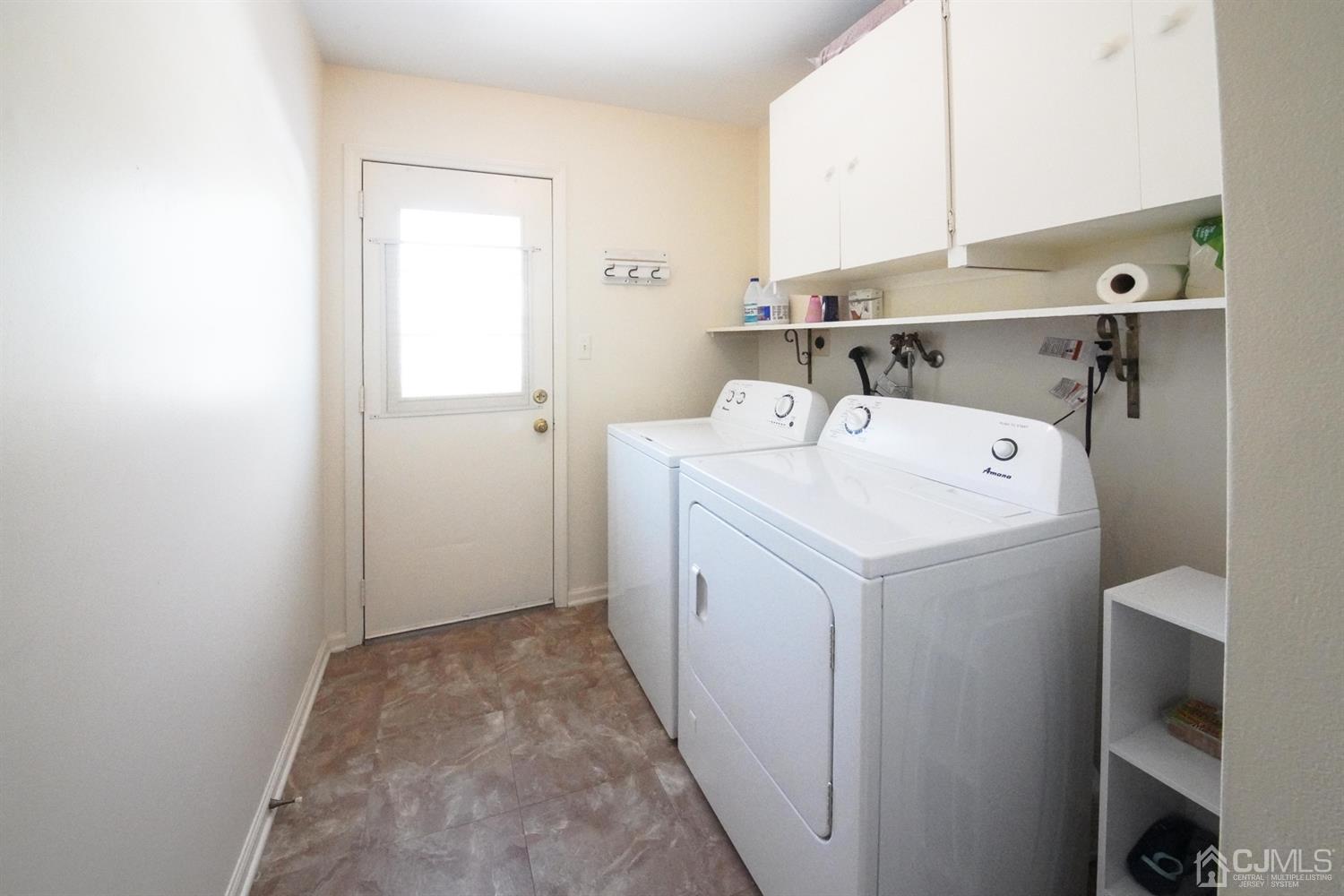 7 Markus Drive Kendall Park, NJ 08824 - Photo 42 of 47 a utility room with dryer and washer