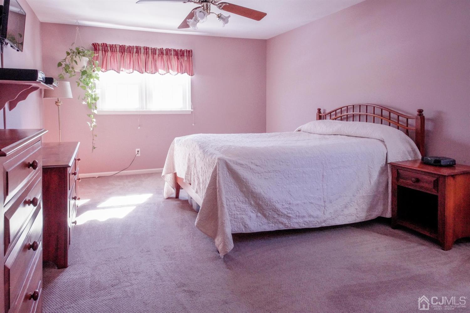 7 Markus Drive Kendall Park, NJ 08824 - Photo 43 of 47 a bedroom with a bed and a window