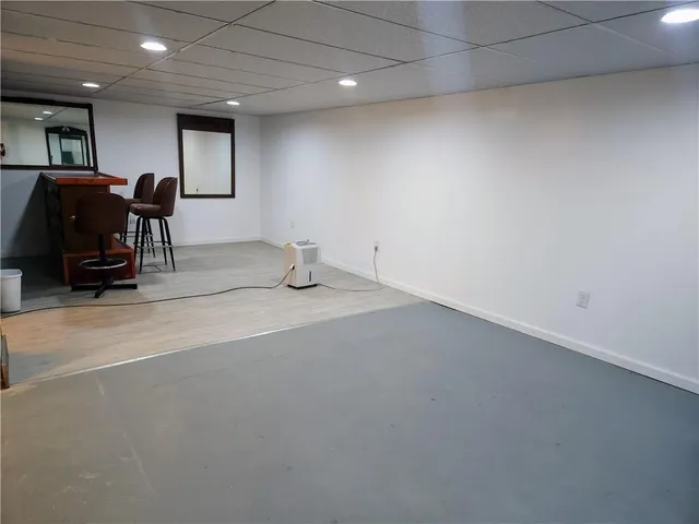 an empty room with furniture