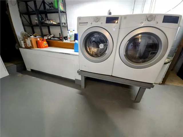a utility room with dryer and washer