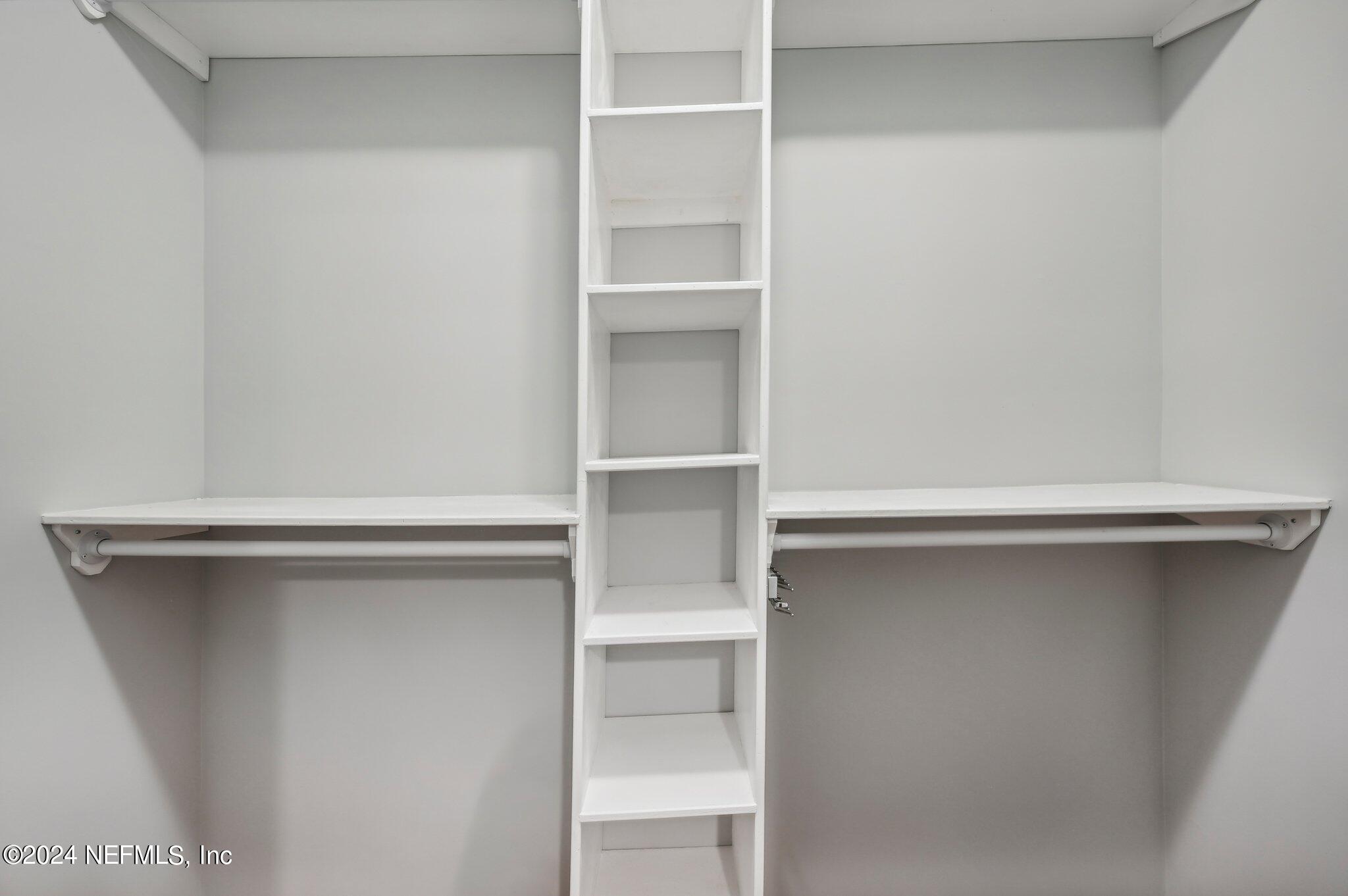 165 Amistad Drive St. Augustine, FL 32086 - Photo 22 of 41 a view of an empty walk in closet