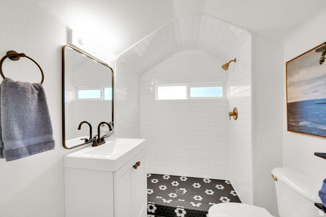 446 South 300 East Provo, UT 84606 - Photo 28 of 32 Walk-in shower with arched ceiling and white subway tile walls