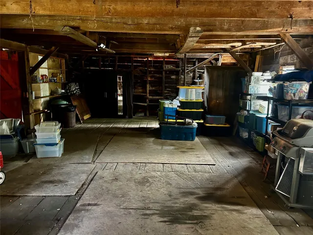 a view of a room with wooden walls