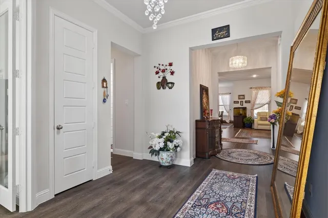 a hallway with view of living room