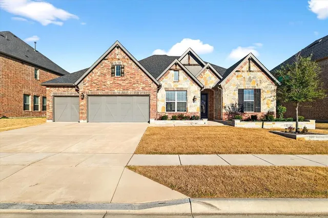 a view of outdoor space yard and front view of a house
