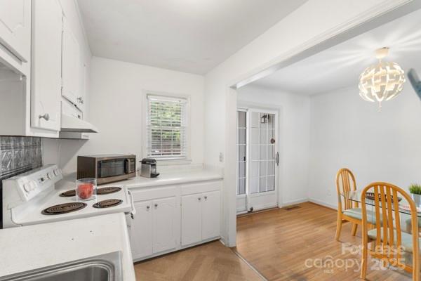 918 McAlway Road, Unit B Charlotte, NC 28211 - Photo 11 of 19 a kitchen with a sink cabinets and appliances