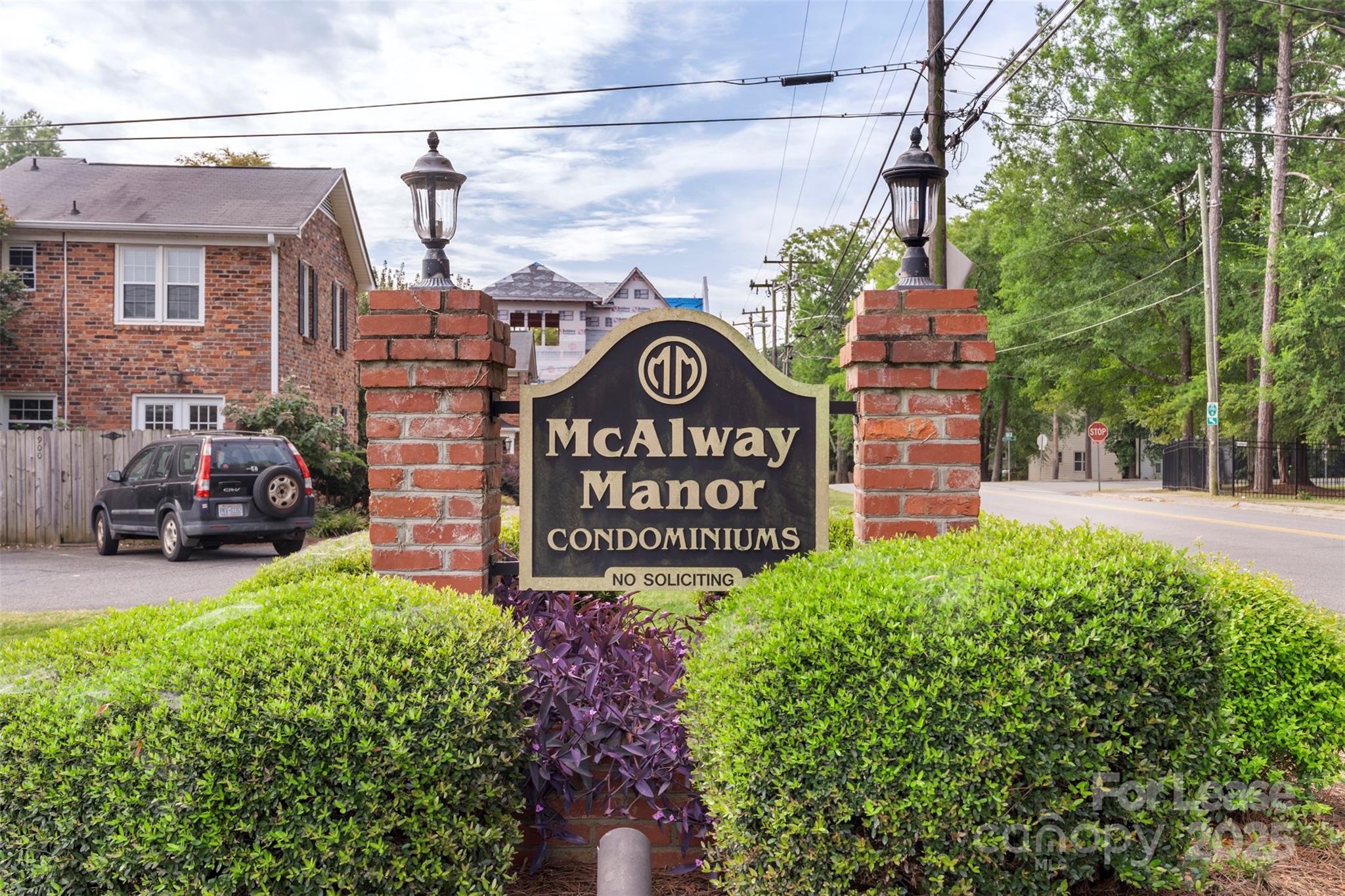 918 McAlway Road, Unit B Charlotte, NC 28211 - Photo 23 of 28 a view of a street with potted plants