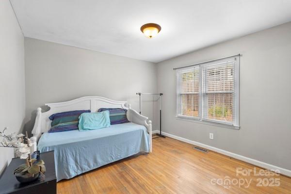 918 McAlway Road, Unit B Charlotte, NC 28211 - Photo 10 of 28 a living room with furniture and a window