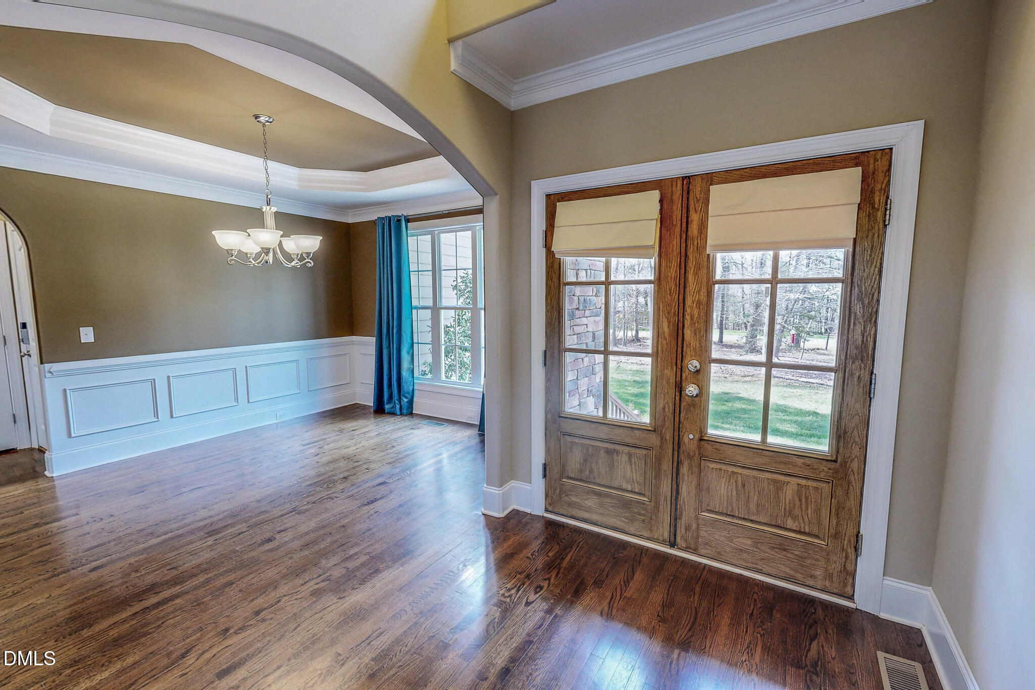 128 Cardens Cove Road Timberlake, NC 27583 - Photo 16 of 54 a view of an empty room with wooden floor and a window