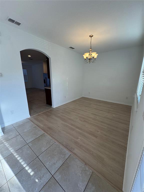 7708 Bexton Lane Windermere, FL 34786 - Photo 2 of 11 a front view of a house with a window