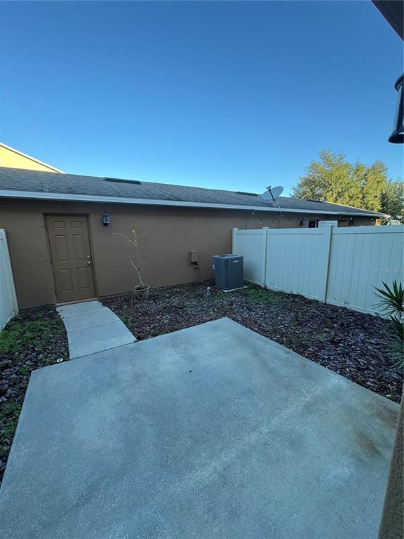 7708 Bexton Lane Windermere, FL 34786 - Photo 6 of 11 a view of a backyard