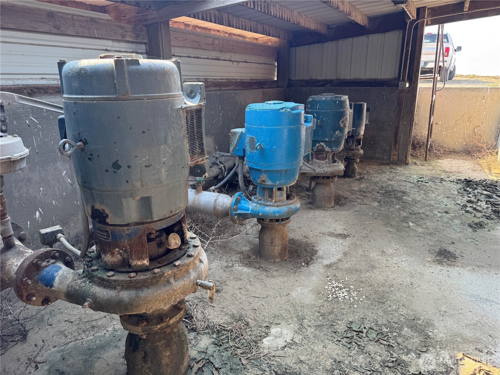 9002 Omer Road Mesa, WA 99343 - Photo 13 of 40 a view of a storage room with water heater and racks