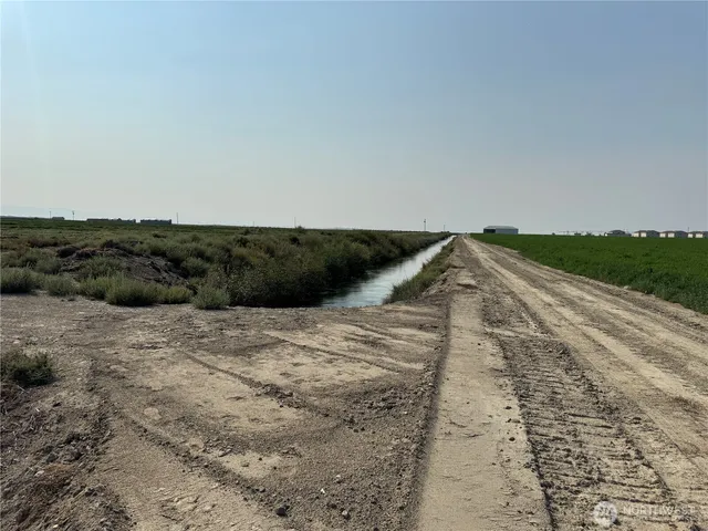 a bathroom with a shower and a window
