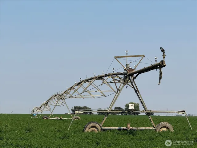 a room with water heater and racks