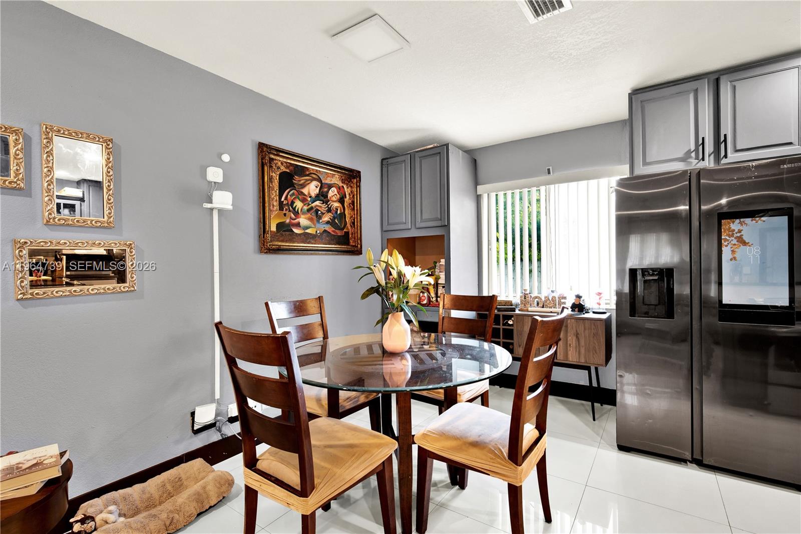 2771 Northwest 8th Street Pompano Beach, FL 33069 - Photo 11 of 27 a view of a dining room with furniture