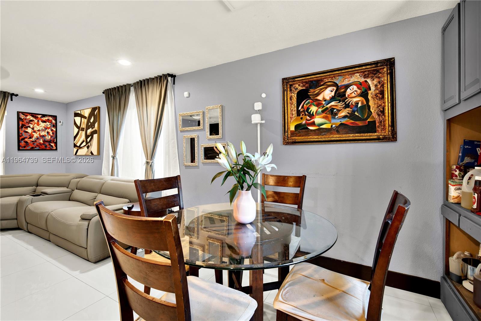 2771 Northwest 8th Street Pompano Beach, FL 33069 - Photo 10 of 27 a living room with furniture and a potted plant