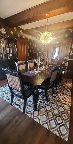 a view of a dining room with furniture