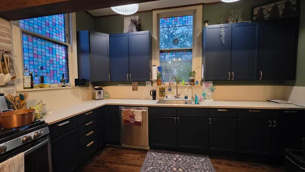 a kitchen with a sink and a cabinets