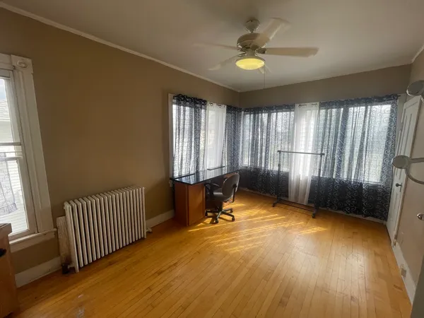 a view of a room with windows