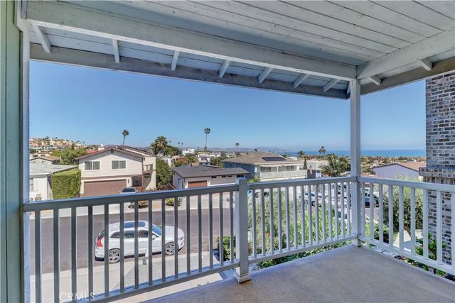 a view of a balcony with an outdoor space