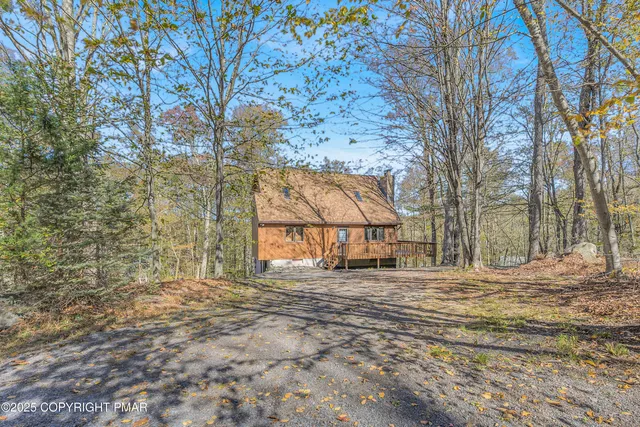 a view of a dining area with furniture and wooden floor