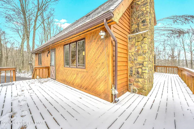 a view of backyard with a patio