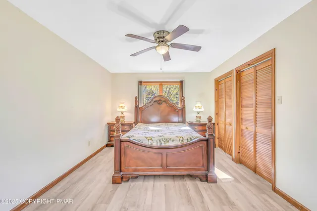 a bathroom with a tub and shower