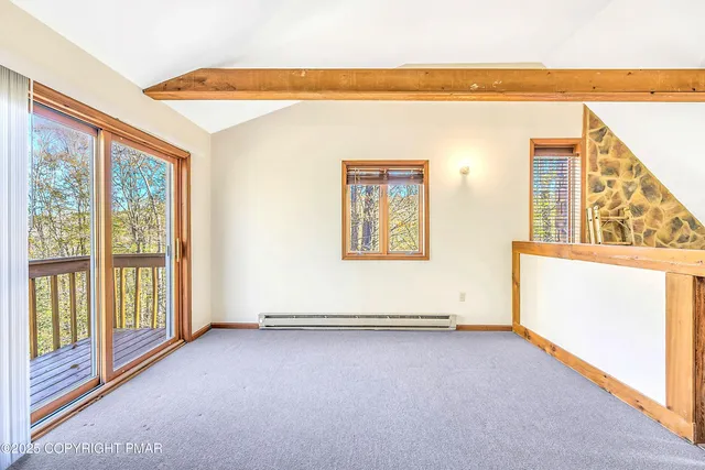 a bed room with a bed and a table