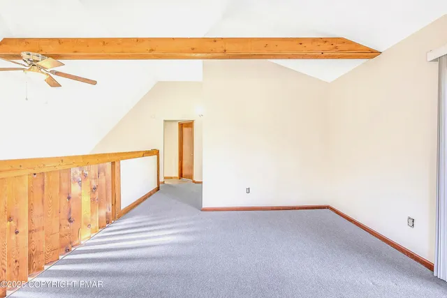 a view of swimming pool with a patio