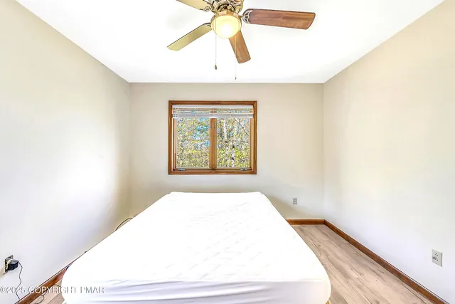 a sign broad on the side of a road